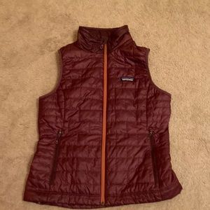 A beautiful maroon Patagonia sleeveless vest!